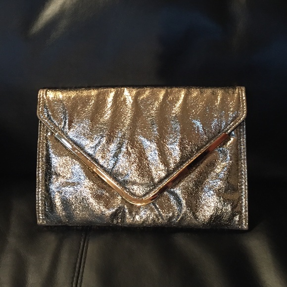 Bebe golden clutch