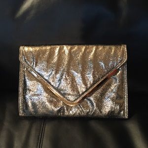 Bebe golden clutch