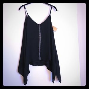 Black, loose fitting tank top with bead work.