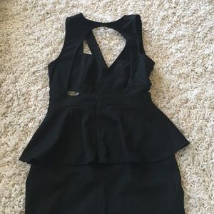 Black little dress ... peplum style, open back