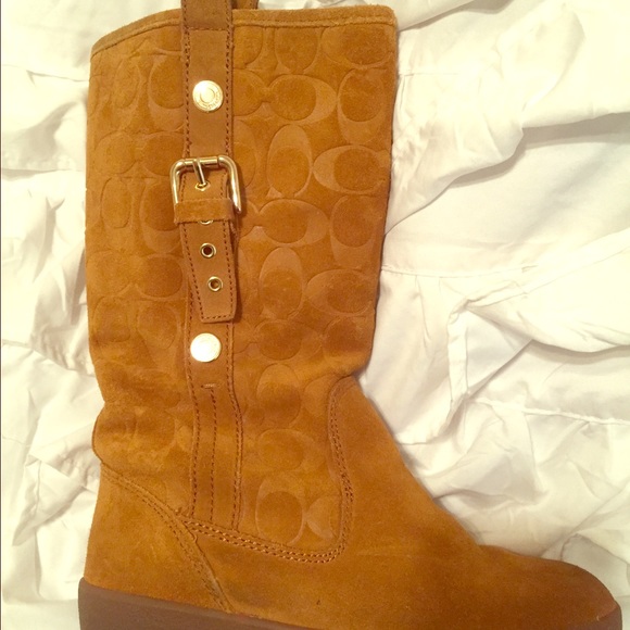 Coach Suede boots with fuzzy inside.