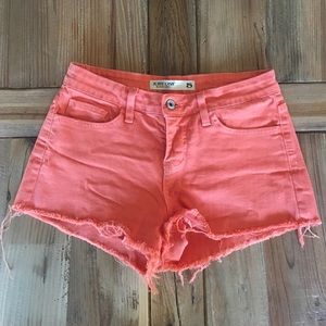 Orange Mid-Rise Cutoff Shorts