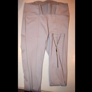 Nude leggings with gold zippers