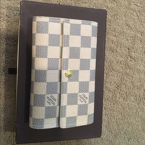 White/ Grey checkered wallet. Louis Vuitton Paris