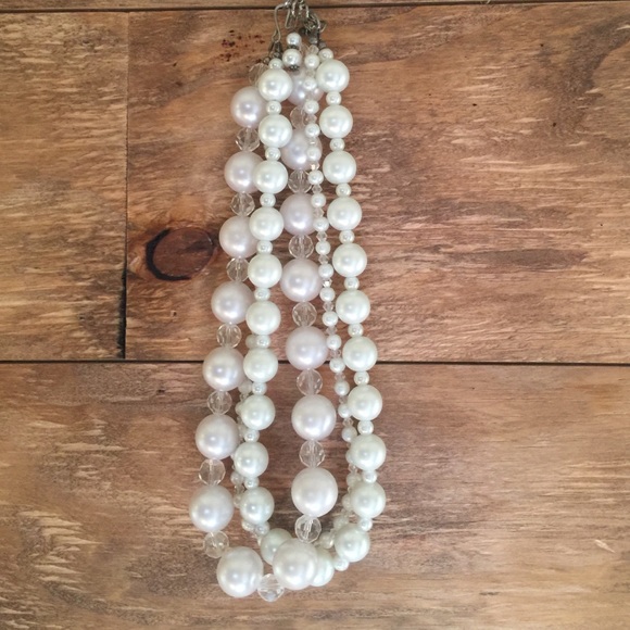 Faux pearl necklace.