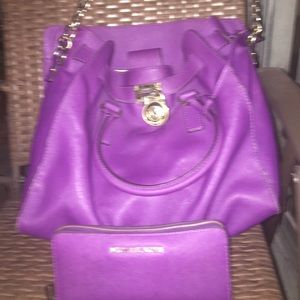 Purple Michael kors purse with matching wallet