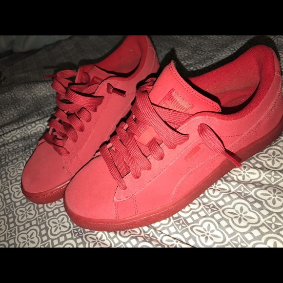Red suede pumas