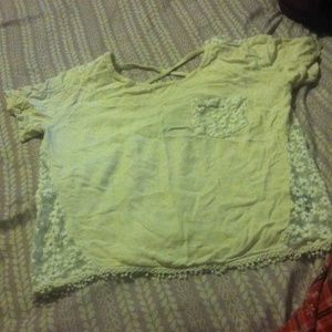 Cute front pocket sheer-lace back flower top!