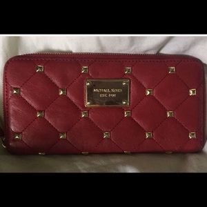 Michael Kors red leather wallet. Beautiful!!