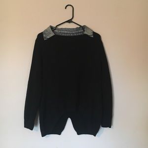 Cute sweater with jean collar and back split.