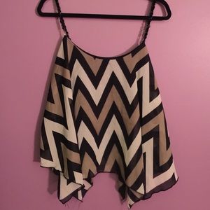 Chevron pattern in neutral tones.