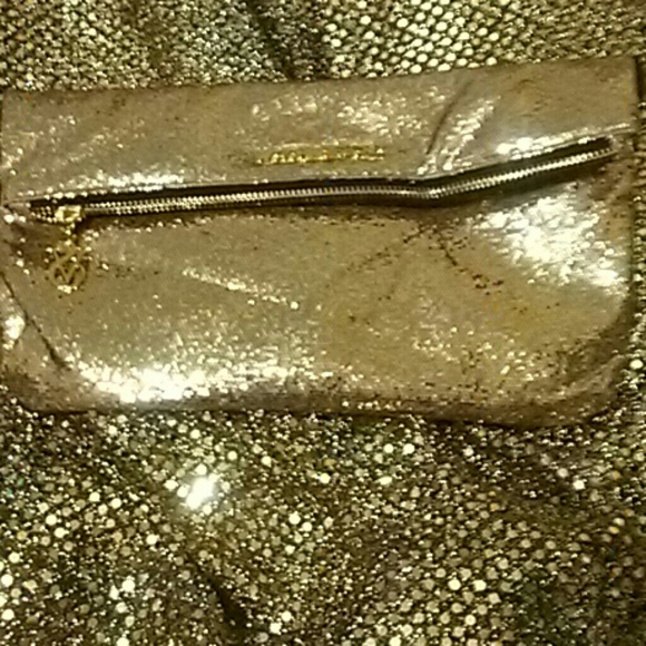 Victoria's Secret Handbags - SOLD SOLD *Victoria's Secret Gold Bag.