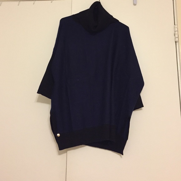 Black and blue poncho