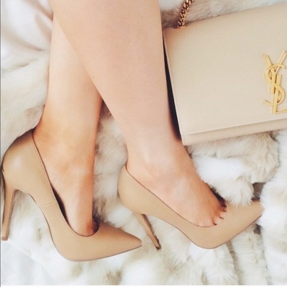 Nude pointy toe pumps