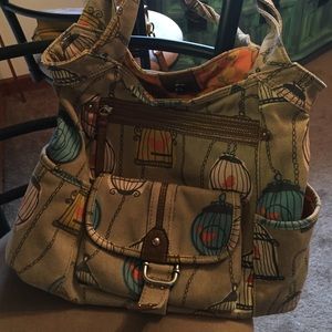 Fossil handbag with bird cages