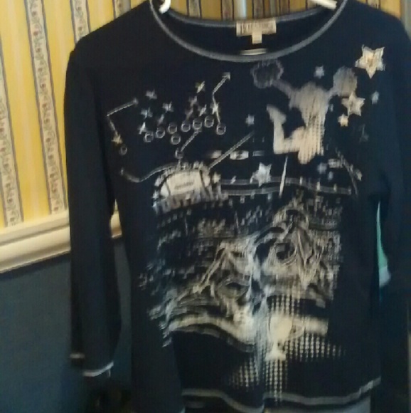 Black knit fall football themed top.