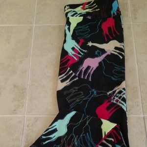 Brand new Multi colored giraffe LulaRoe leggings