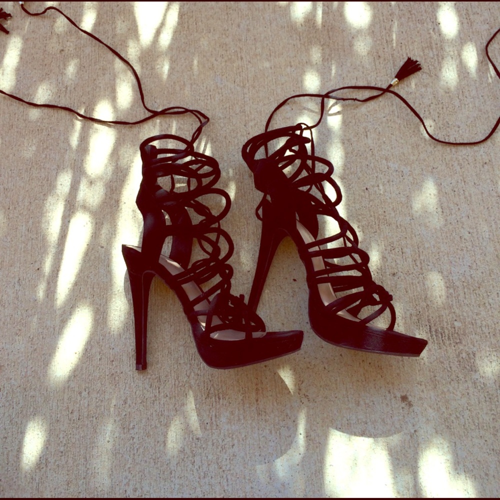 Black strapping heels
