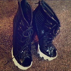 Black lace up platforms.