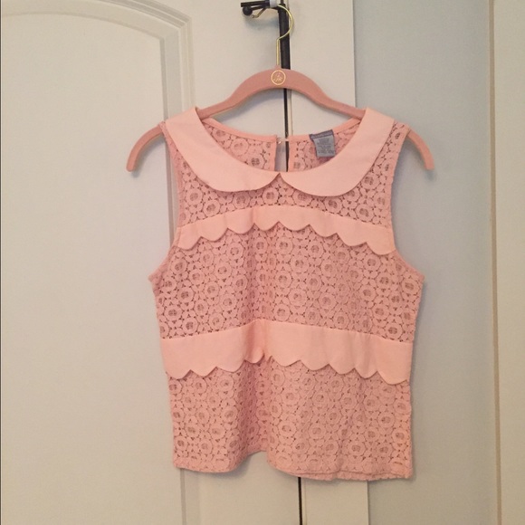 pink top. see through with ruffles