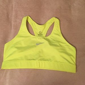 Nike Dri-Fit sports bra in neon yellow.