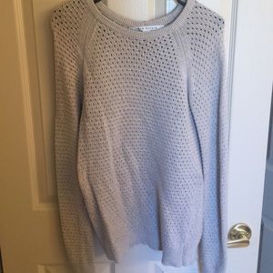 Super cute sweater with bottoms down the back.