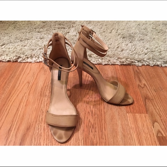 Nude strap sandal heel.