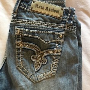 Size 29 distressed boot cut Rock Revival jeans