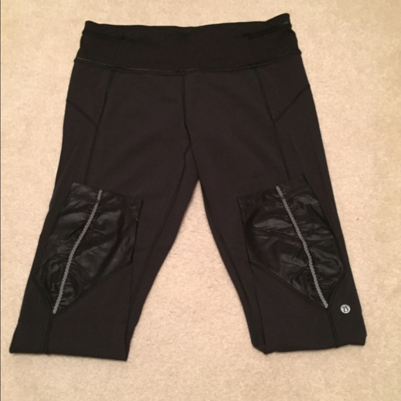 Lulu Black Pace Queen tights w/ ruched detailing.