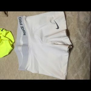White Nike pro shorts