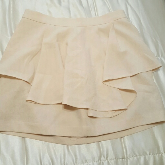 Cream ruffle mini skirt