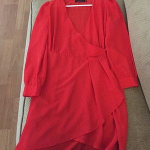 Red wrapped long sleeve dress
