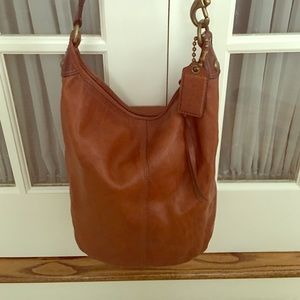 Brown leather oversized Coach cross body bag