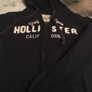hollister dark blue zip up size L.