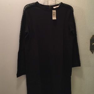 Black sweater dress with eyelet cut out sleeves
