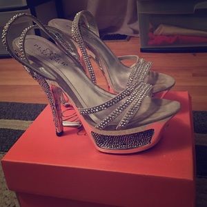 Pleaser four inch heels.