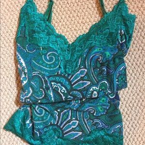 Beautiful tank pair with crisp white shorts jeans