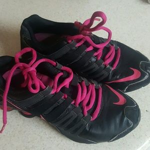 Pink Nike running shoes