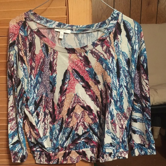 This is a delia's feather/tribal top.