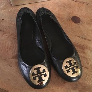 Black and gold Reva flats