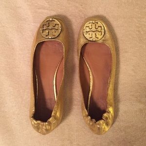Tory Burch Gold Flats with rope accent.