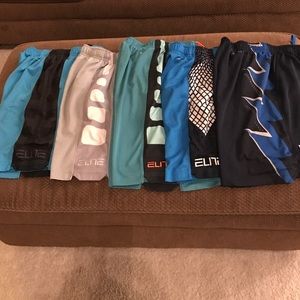 Five pairs of Nike Elite shorts youth small