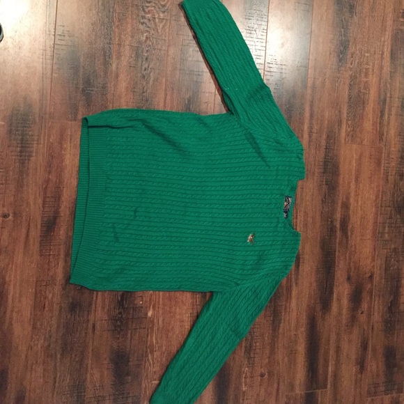 Two cable knit sweaters