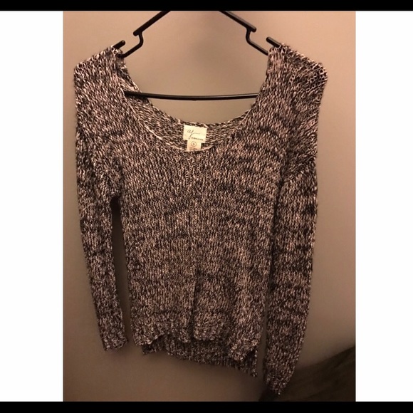 Thin black and white sweater.