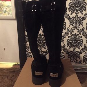 Black suede UGGS lined with sheep skin