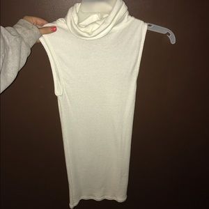 White sleeveless turtleneck
