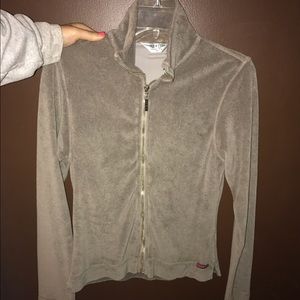 Brown/gray zip up hard tail jacket.