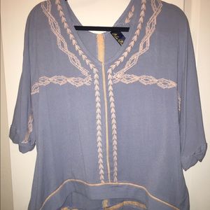 Francesca's baby blue and pale pink blouse