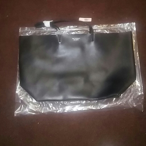 Black new with tags Victoria secret purse