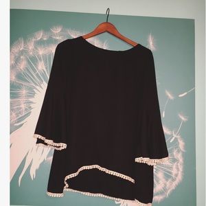 Adorable black bell sleeve top with white trim